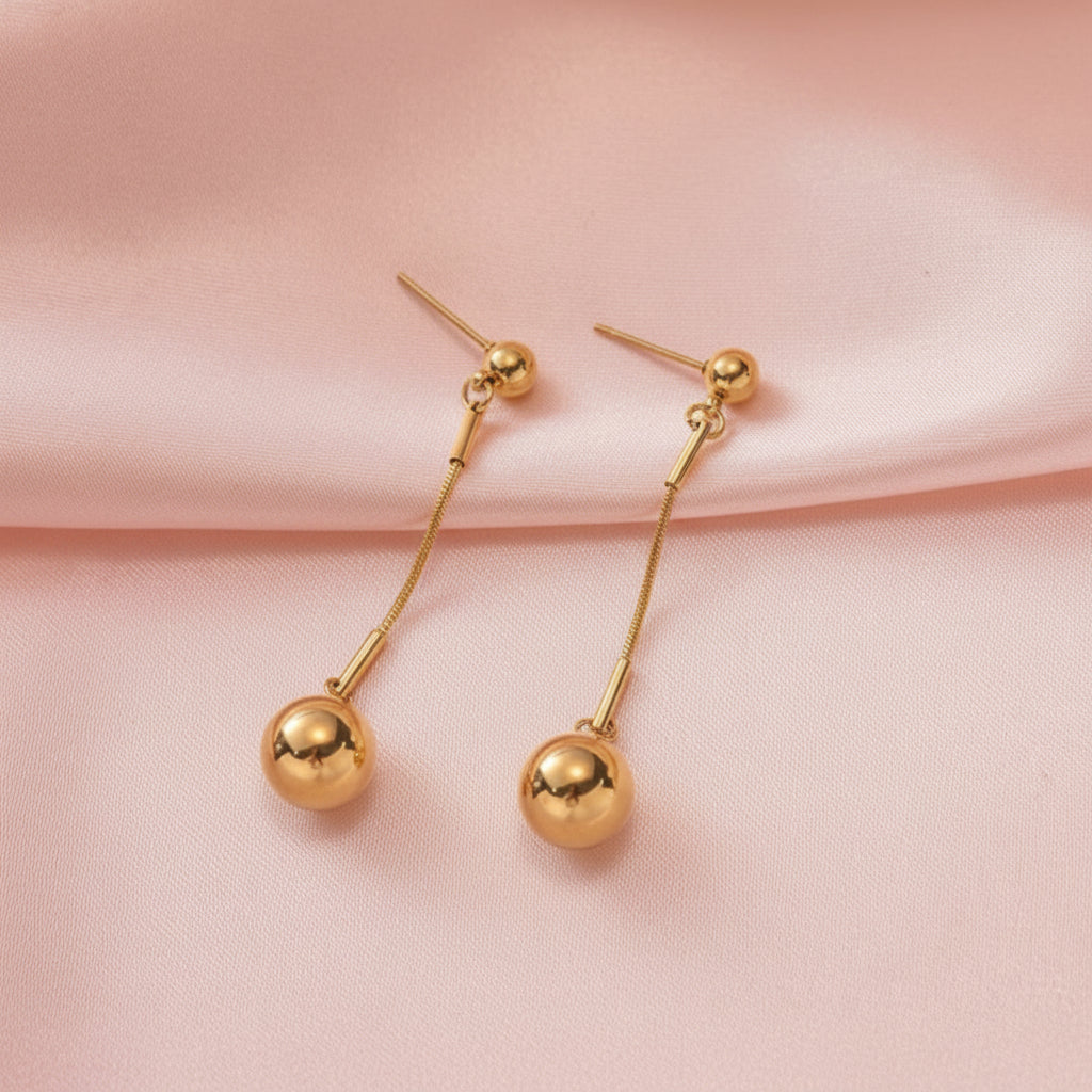 The Golden Sphere Drops